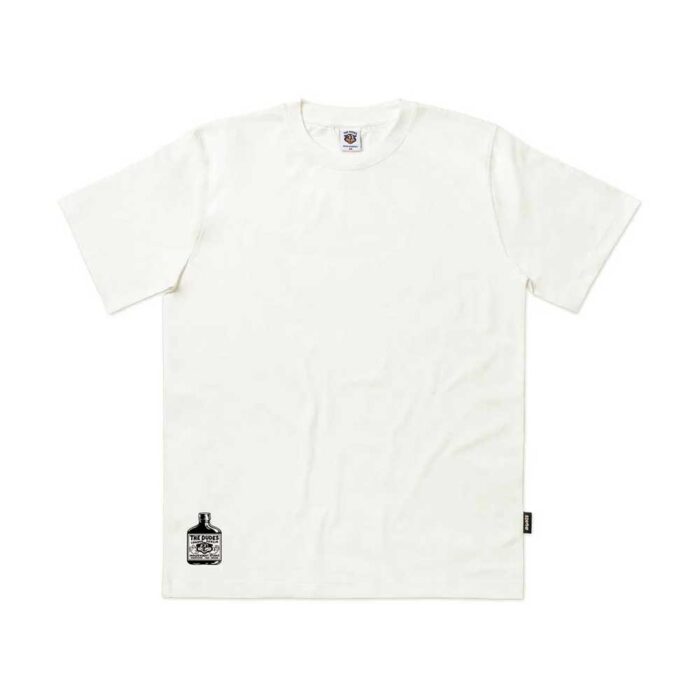 The Dudes Dudes Studio Label T-Shirt Off White με artwork McBess, οργανικό βαμβάκι και υφαντές λεπτομέρειες.